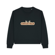 black christmas sweater with the slogan 'christmas' and antlers poking out of the top