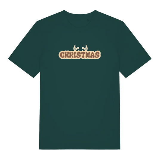 green christmas t-shirt with the word christmas and antlers coming from the top of it