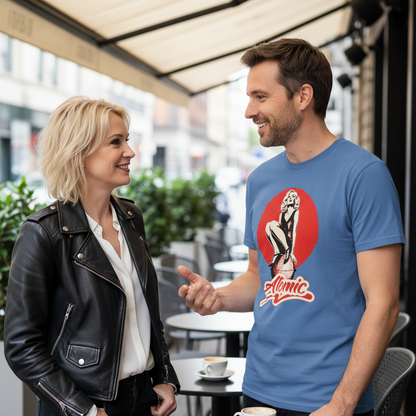 Man and woman having a conversation outdoors with a man wearing a blue t-shirt with a graphic design.