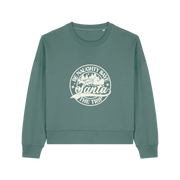 green xmas sweater with the slogan 'be naughty save santa the trip'