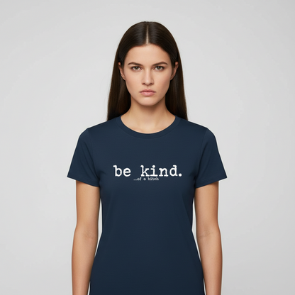 Woman wearing a navy blue t-shirt with 'be kind' text on a light gray background