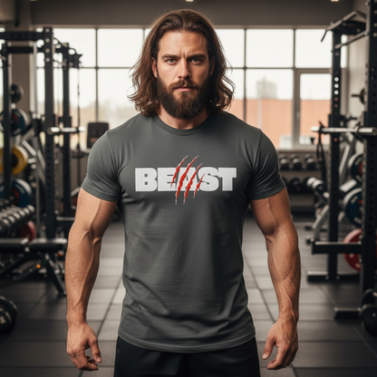 Man wearing a gray t-shirt with 'BEAST' printed on it in a gym setting