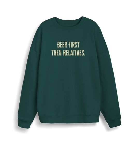 green christmas slogan sweater with 'beer first then relatives'