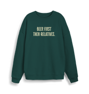 green christmas slogan sweater with 'beer first then relatives'