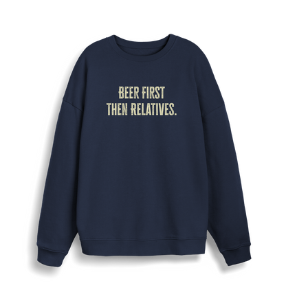 navy christmas slogan sweater with 'beer first then relatives'