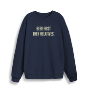 navy christmas slogan sweater with 'beer first then relatives'