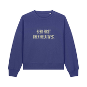 blue christmas sweater with the slogan 'beer first then relatives'