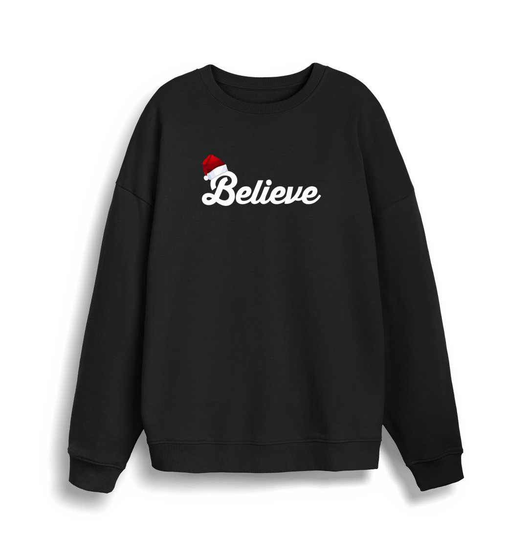 black christmas sweate with the slogan 'believe' and a santa hat on top of the b