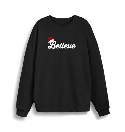 black christmas sweate with the slogan 'believe' and a santa hat on top of the b