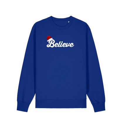 blue christmas sweate with the slogan 'believe' and a santa hat on top of the b