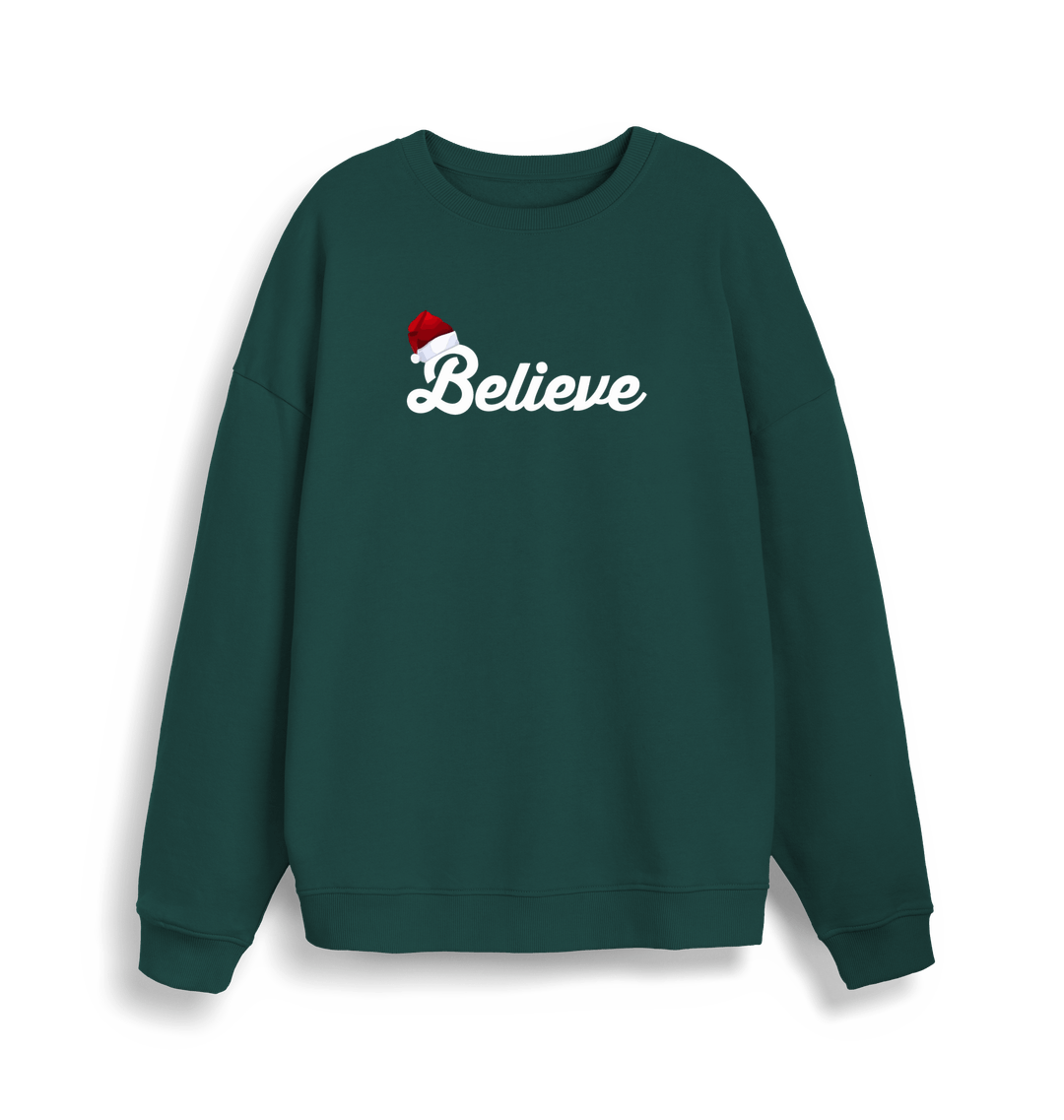 green christmas sweate with the slogan 'believe' and a santa hat on top of the b