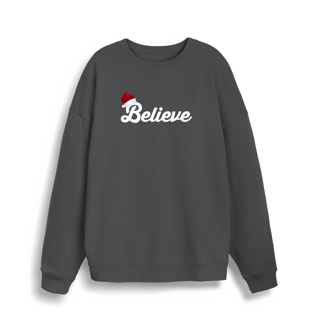 grey christmas sweate with the slogan 'believe' and a santa hat on top of the b