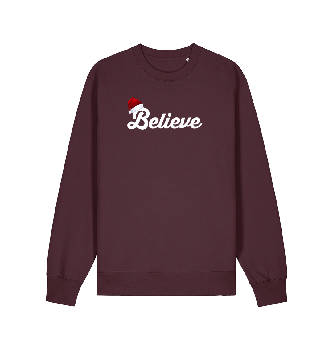 red brown christmas sweate with the slogan 'believe' and a santa hat on top of the b