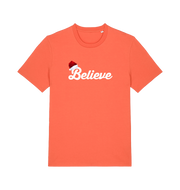 orange christmas t-shirt with the slogan 'believe' and a santa hat on the b