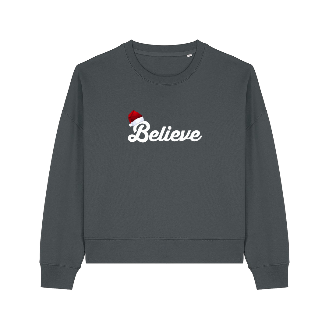 grey christmas sweater with the slogan 'believe' and a santa hat on top of the b