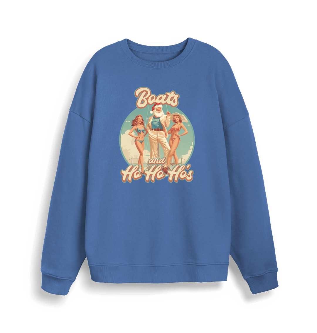blue christmas sweater with the graphic of santa stood between two women and the slogan 'boats and ho ho ho's'