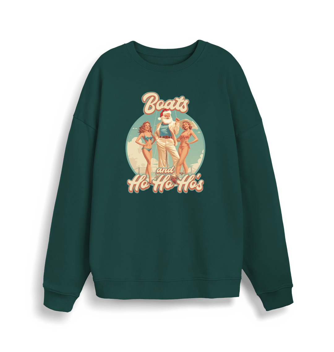 green christmas sweater with the graphic of santa stood between two women and the slogan 'boats and ho ho ho's'