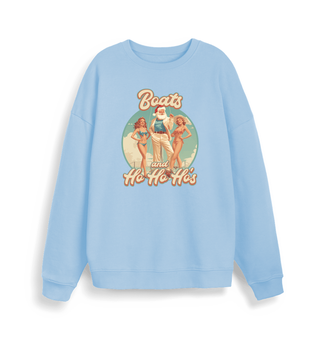 light blue christmas sweater with the graphic of santa stood between two women and the slogan 'boats and ho ho ho's'