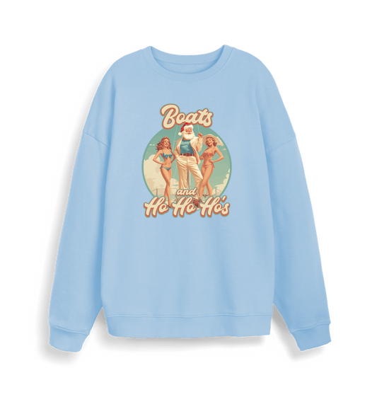 light blue christmas sweater with the graphic of santa stood between two women and the slogan 'boats and ho ho ho's'