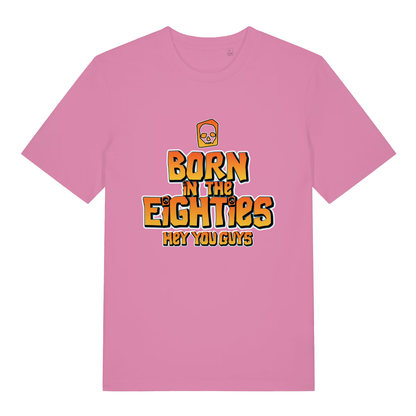 Pink women's Born in the Eighties T-shirt flat lay with cheeky movie-inspired text and skull graphic