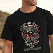 Person wearing a black film inspired t-shirt with a graphic design of a Death's-head Hawk-moth and text.