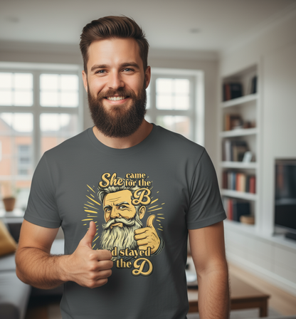 Man wearing a t-shirt with a graphic design in a living room setting