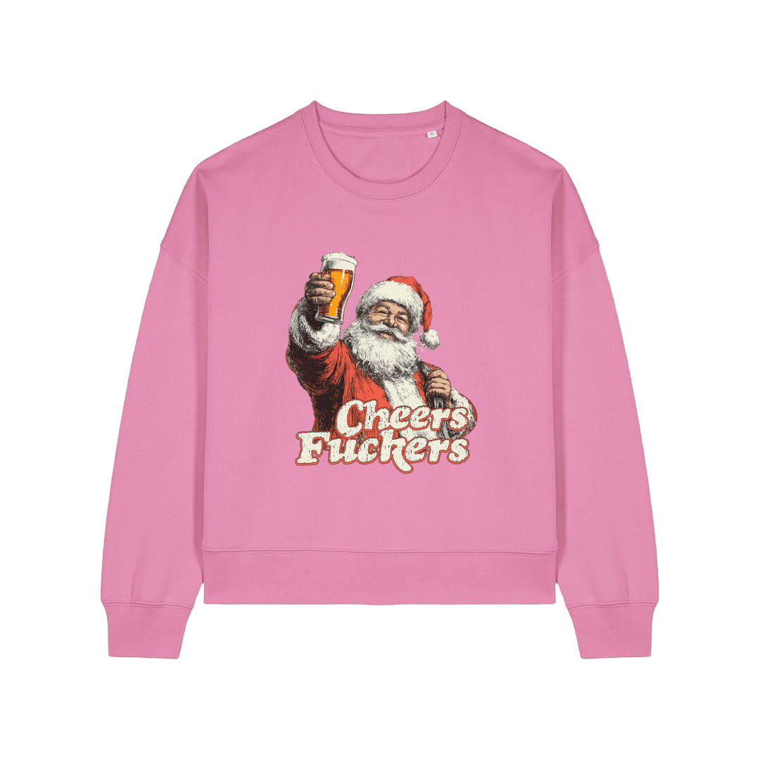 pink christmas sweater with a graphic of santa raising a pint and the slogan 'cheers fuckers'