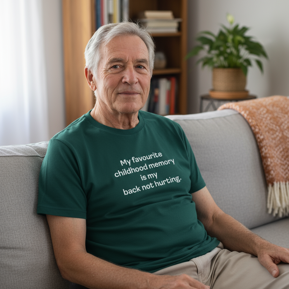 old man wearing a green t-shirt that reads 'my favourite childhood memory is my back not hurting'