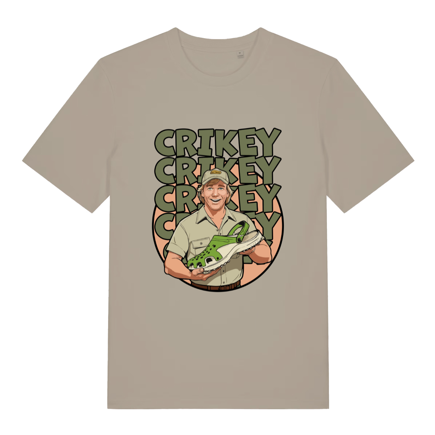 Beige Crikey Crocs T-shirt flat lay with funny Steve Irwin style holding green Croc graphic