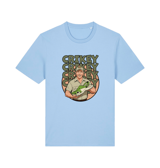 light blue graphic t-shirt inspired by steve irwin, with a person holding a croc and the text crikey