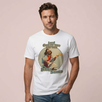 Man in white Daily Shred t-shirt, fun witty graphic rocking jesus pun tee