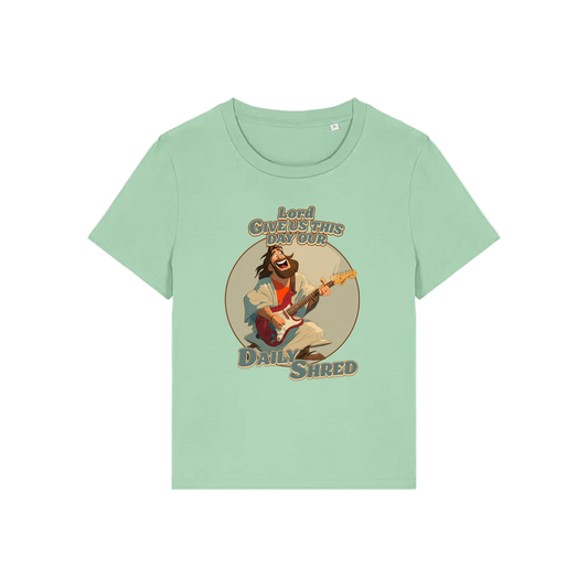 green funny jesus t-shirt with the graphic of jesus playing a guitar and the slogan 'lord give us this day our daily shred'