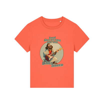 orange funny jesus t-shirt with the graphic of jesus playing a guitar and the slogan 'lord give us this day our daily shred'