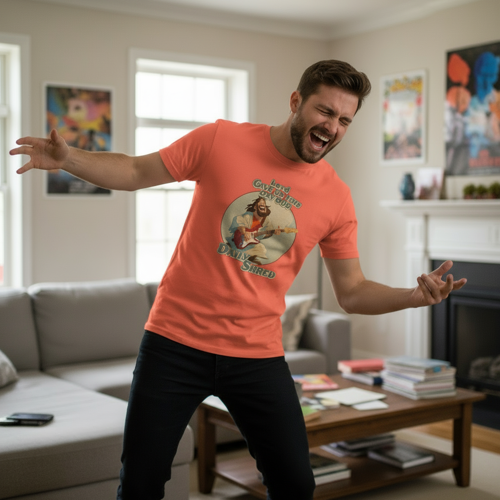 man wearing a graphic t-shirt with jesus playing the guitar whilst dancing 