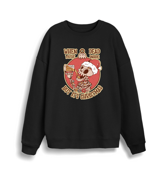 black christmas jumper with the graphic of a skeleton drinking a beer and the slogan 'when you're dead inside but it's christmas'