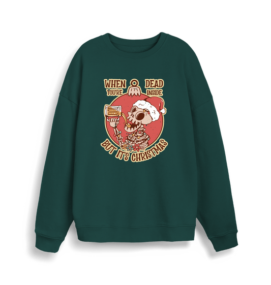 green christmas jumper with the graphic of a skeleton drinking a beer and the slogan 'when you're dead inside but it's christmas'