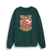 green christmas jumper with the graphic of a skeleton drinking a beer and the slogan 'when you're dead inside but it's christmas'