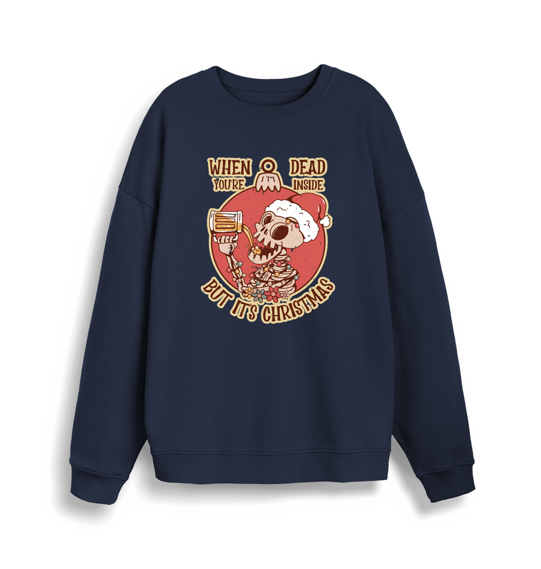 navy christmas jumper with the graphic of a skeleton drinking a beer and the slogan 'when you're dead inside but it's christmas'