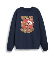 navy christmas jumper with the graphic of a skeleton drinking a beer and the slogan 'when you're dead inside but it's christmas'