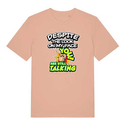peach women's funny slogan t-shirt with the text 'despite the look on my face you are still talking'