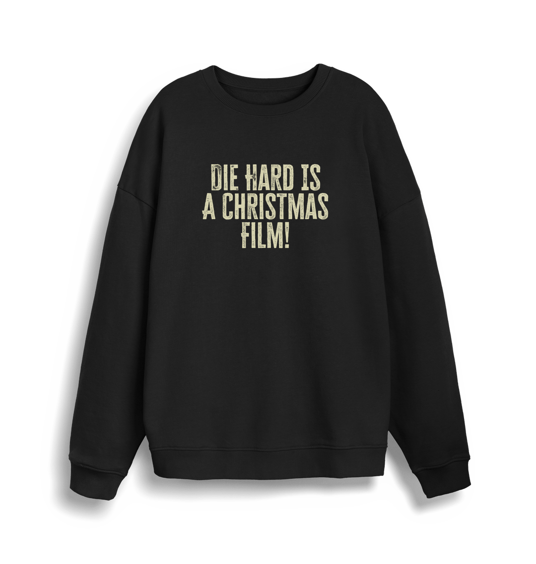 black christmas jumper with the slogan 'die hard is a christmas film'