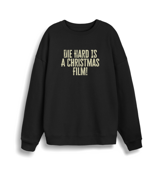 black christmas jumper with the slogan 'die hard is a christmas film'