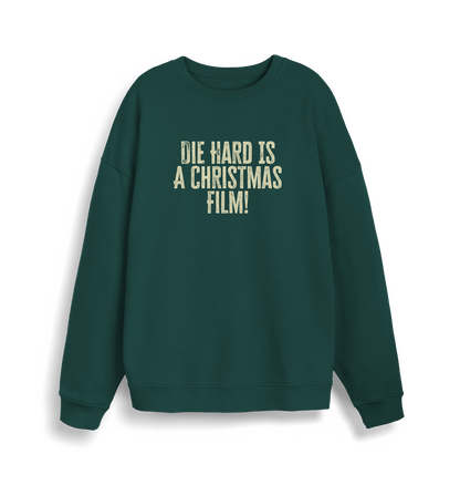 green christmas jumper with the slogan 'die hard is a christmas film'