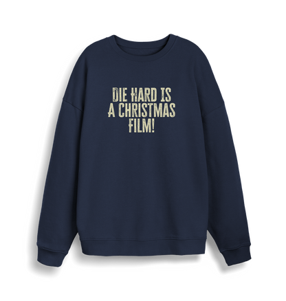navy christmas jumper with the slogan 'die hard is a christmas film'
