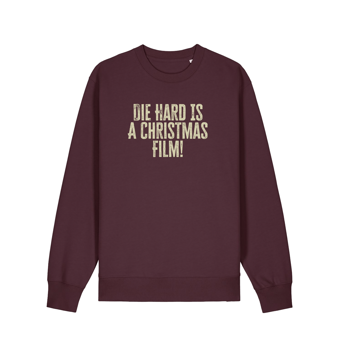 red brown christmas jumper with the slogan 'die hard is a christmas film'