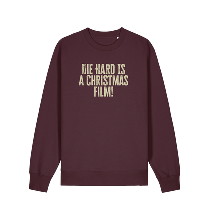 red brown christmas jumper with the slogan 'die hard is a christmas film'