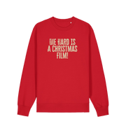 red christmas jumper with the slogan 'die hard is a christmas film'