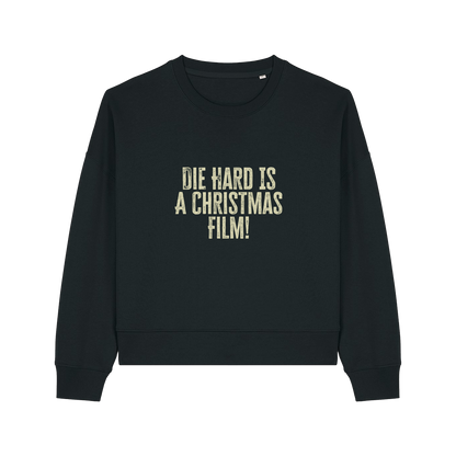 black christmas jumper with the slogan 'die hard is a christmas film'
