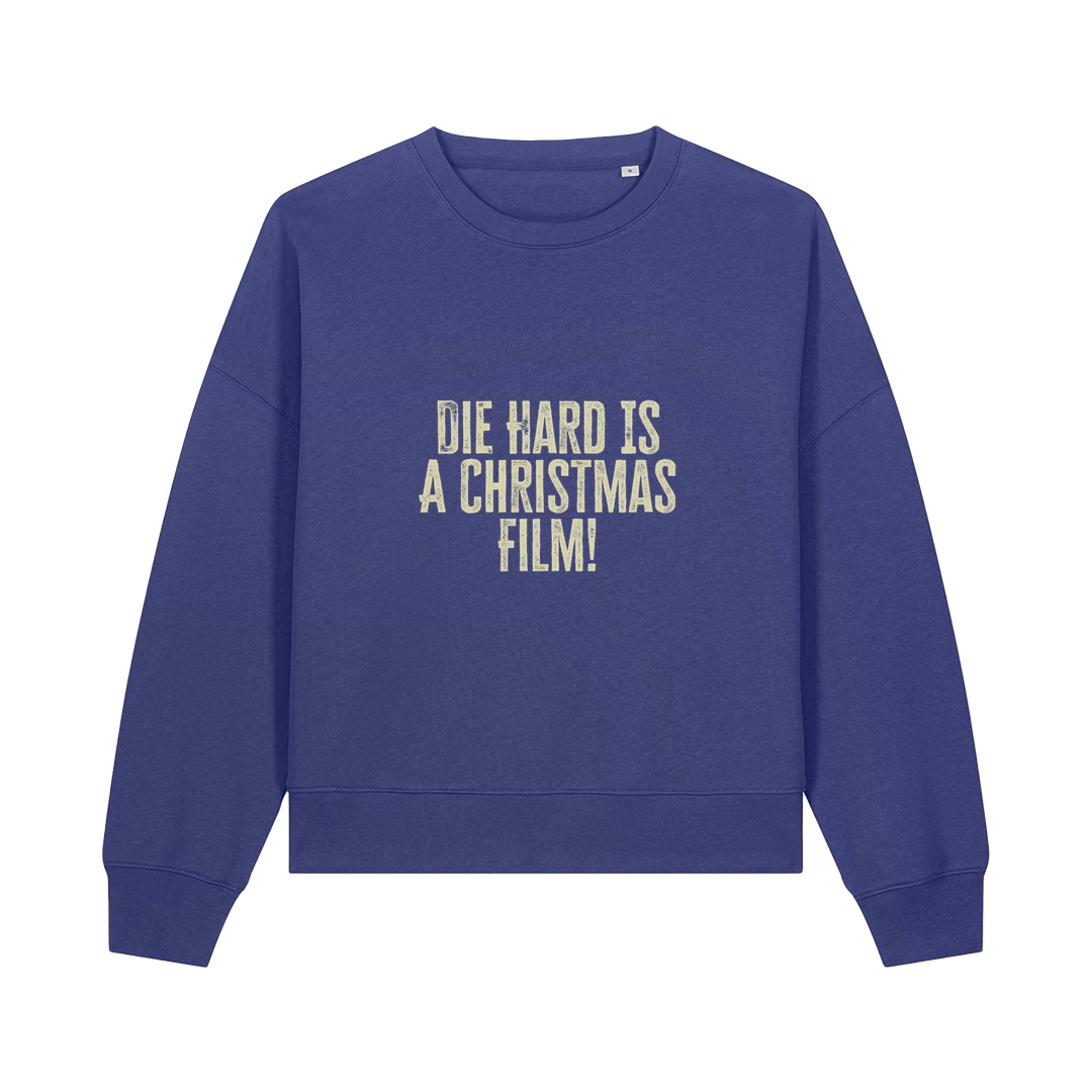 blue christmas jumper with the slogan 'die hard is a christmas film'