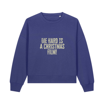 blue christmas jumper with the slogan 'die hard is a christmas film'
